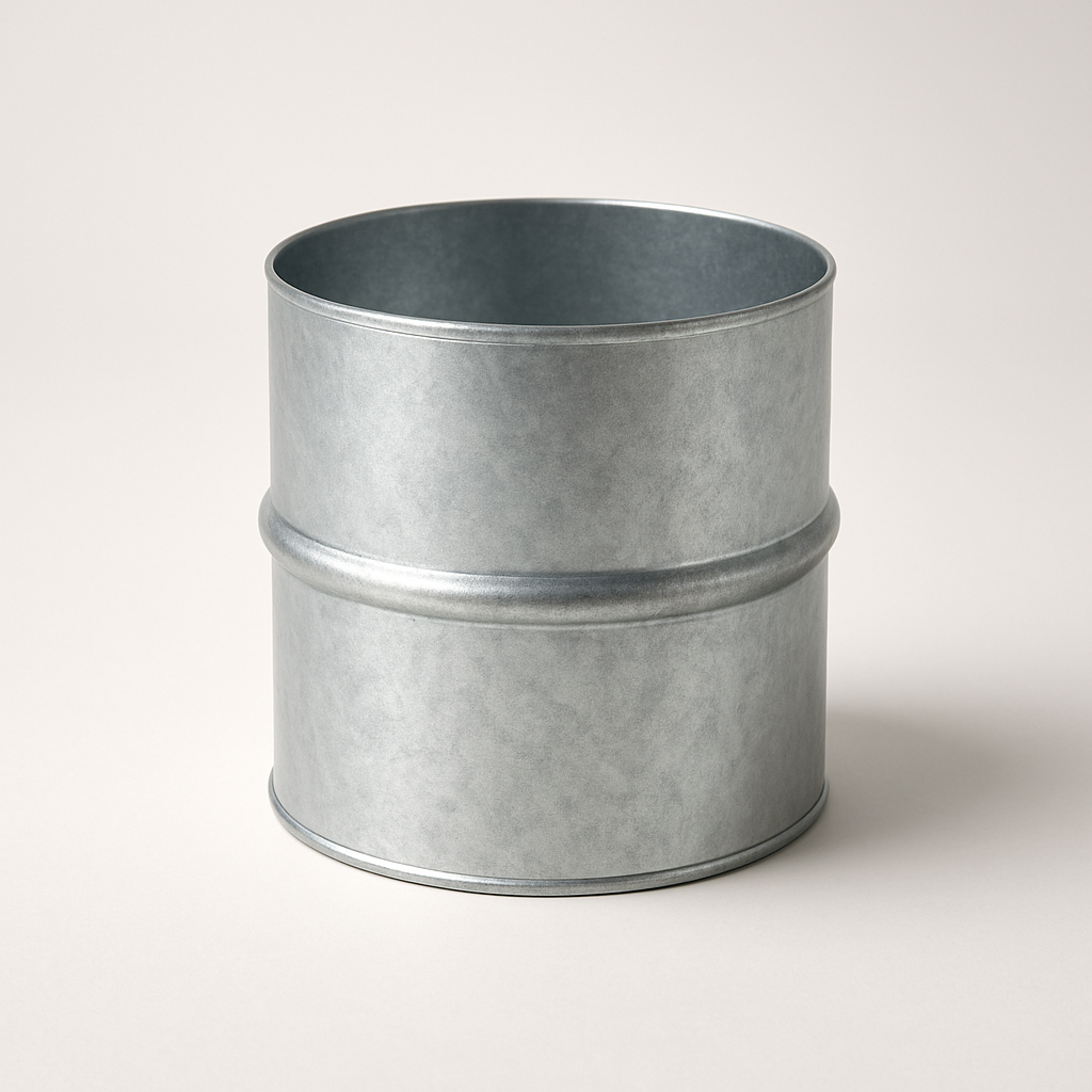 inline metal duct sleeve viewed close up with smooth cylindrical body and open ends