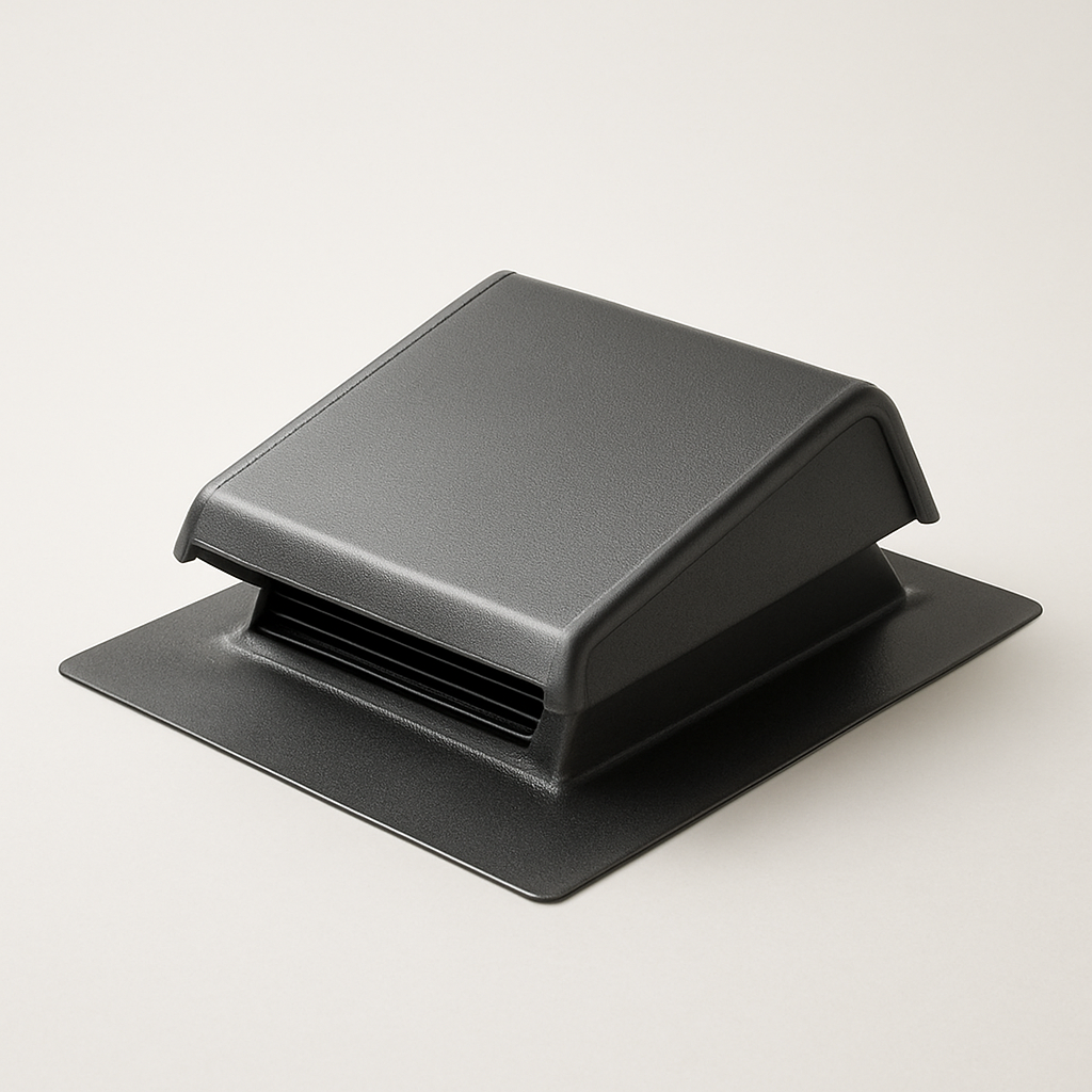 angled metal duct termination with stepped flashing set on a dark shingle sample